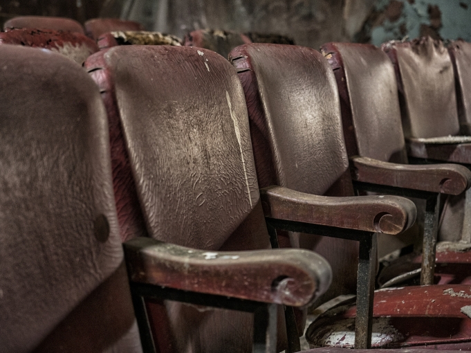 Empty theatre seats in the process of disintegrating